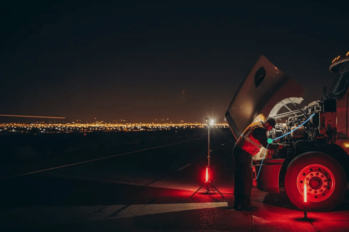 AZ Mobile Diesel mechanic performing electrical work on a truck cab in Phoenix